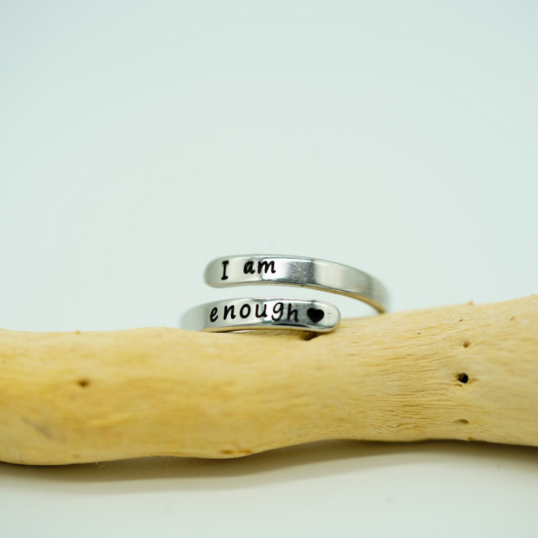 I Am Enough ring on driftwood